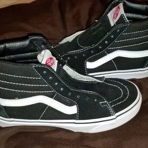 White and Black Hightop Vans